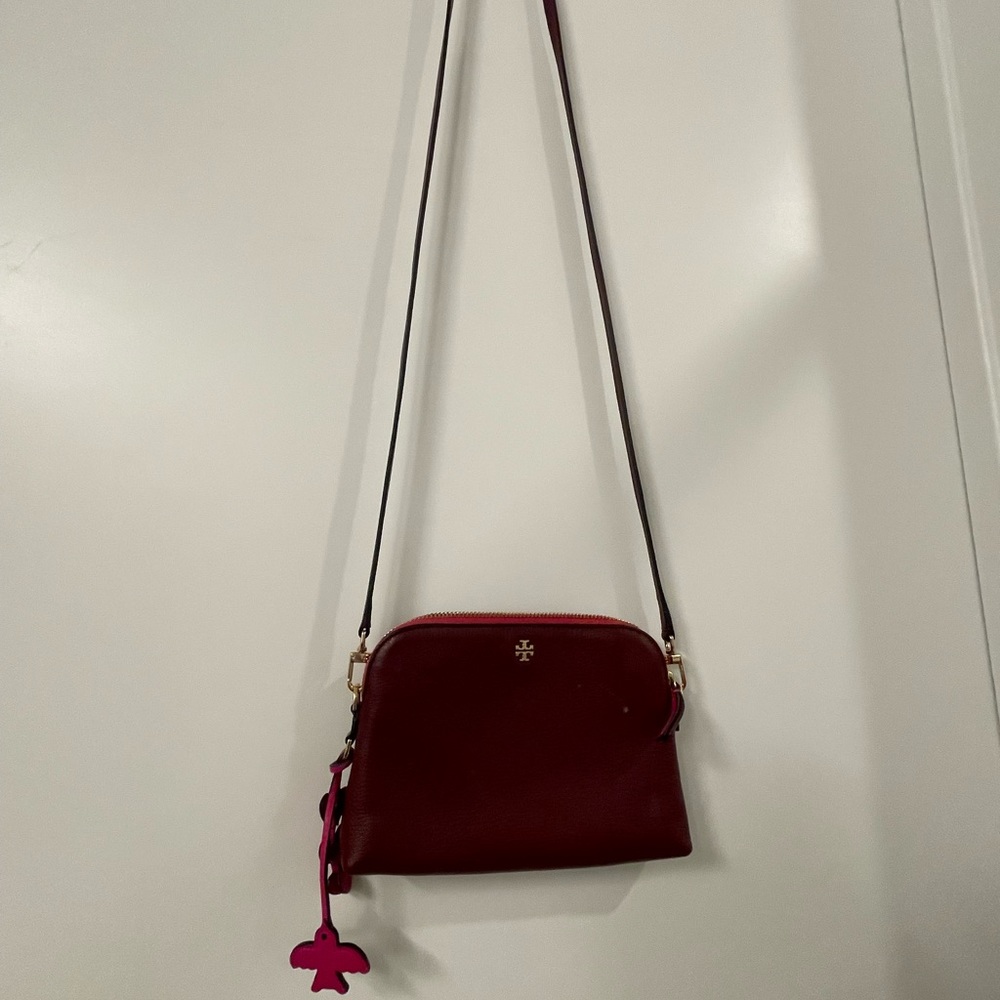 Tory Burch Peace Pebbled Cross-body. Worn a few times. Tag included.